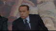 Premiér Berlusconi na pranýři
