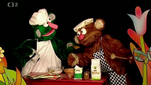 Jůheláci pokračují v kuchtění dortu. Dort voní paloučkem a Mufikanti Filip s Tomášem na něj zazpívají Ódu...