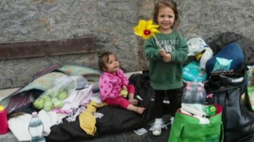 Uprchlíci objektivem fotografa