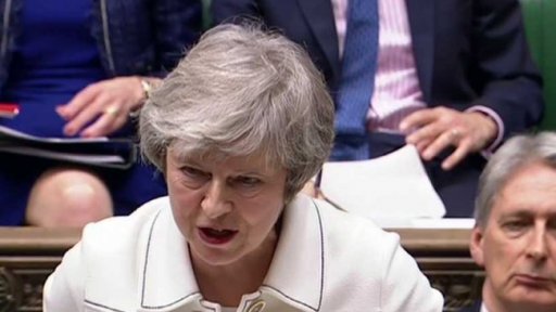 Britští poslanci před hlasováním