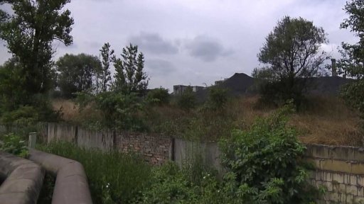 Spor o tuny prachu z uhelné skládky