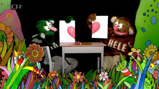 Jůheláci malují dětem obrázek.