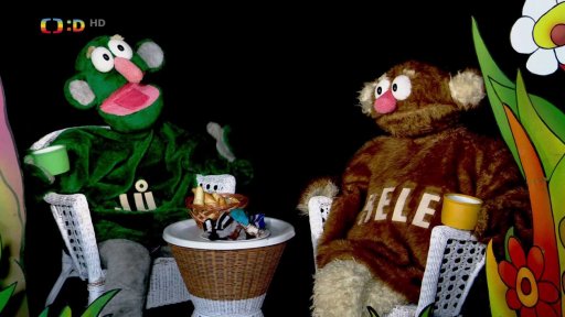 Muf si dál zahrává s kouzelnou hůlkou, což se mu nevyplatí. Ještěže jsou Jůheláci dobráci a vyčarují ho z rampouchu zpět.