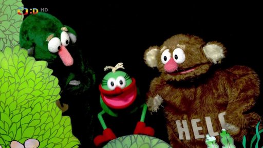 Muf se ve filmu promění v horu cukrlat a Fámula mu řekne, že je k sežrání.