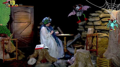 Jezinka mastí Člověče nezlob se, v tom se zjeví Mufopýr a chce sladký poklad. Jezinka mu slíbí pomoc, je totiž červen, a to se otevírají poklady.